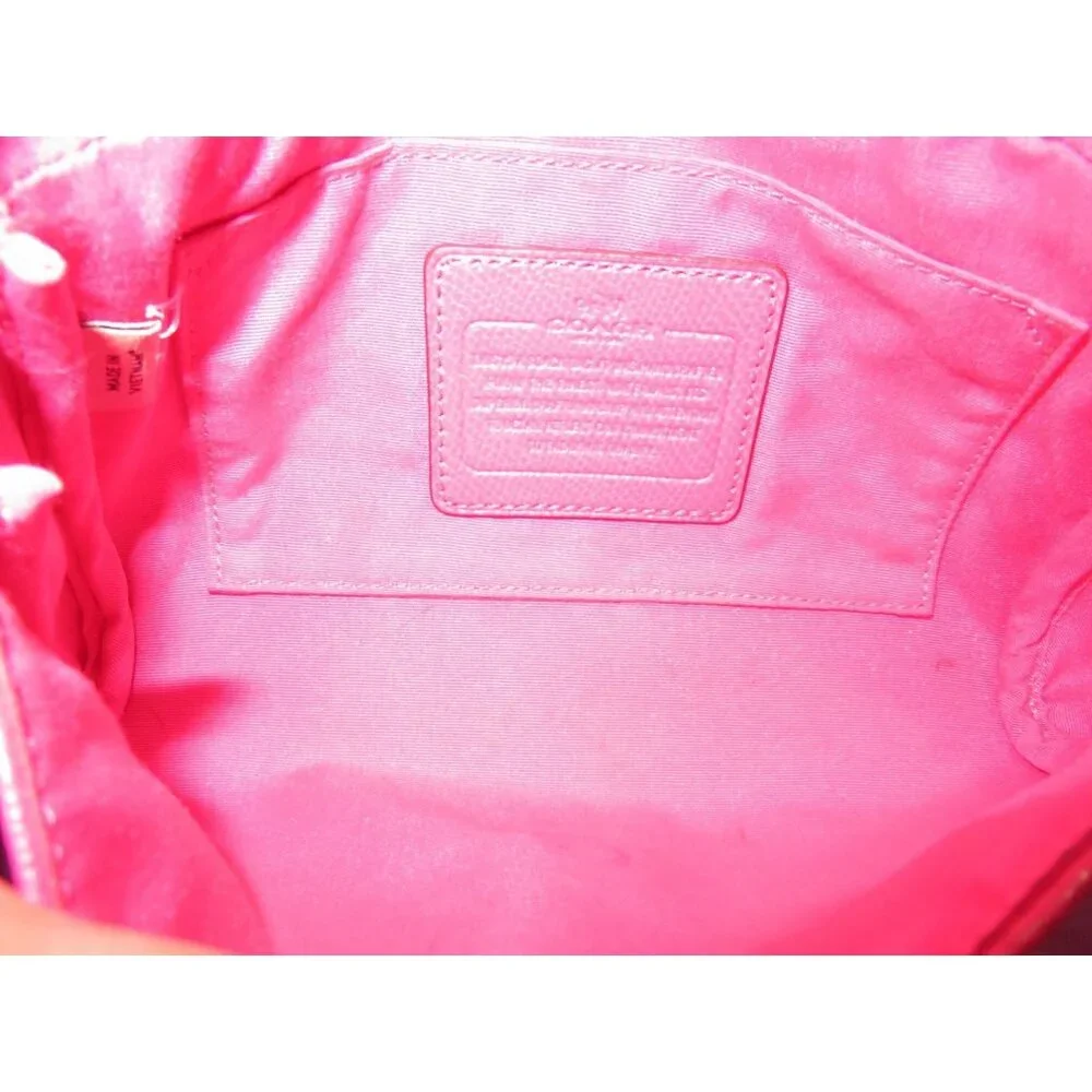 Coach Pink Cross grain Leather Mini Ruby Turn Lock Crossbody Handbag